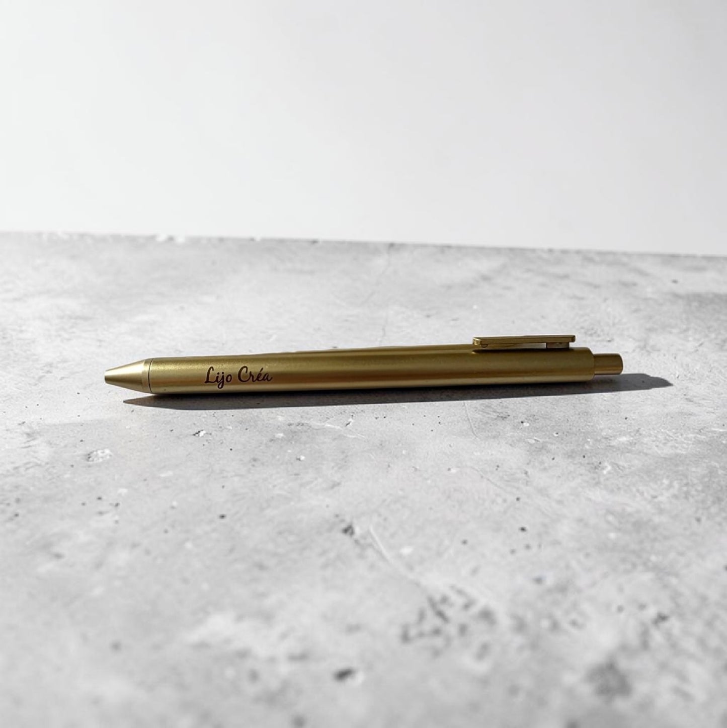 stylo doré gravé