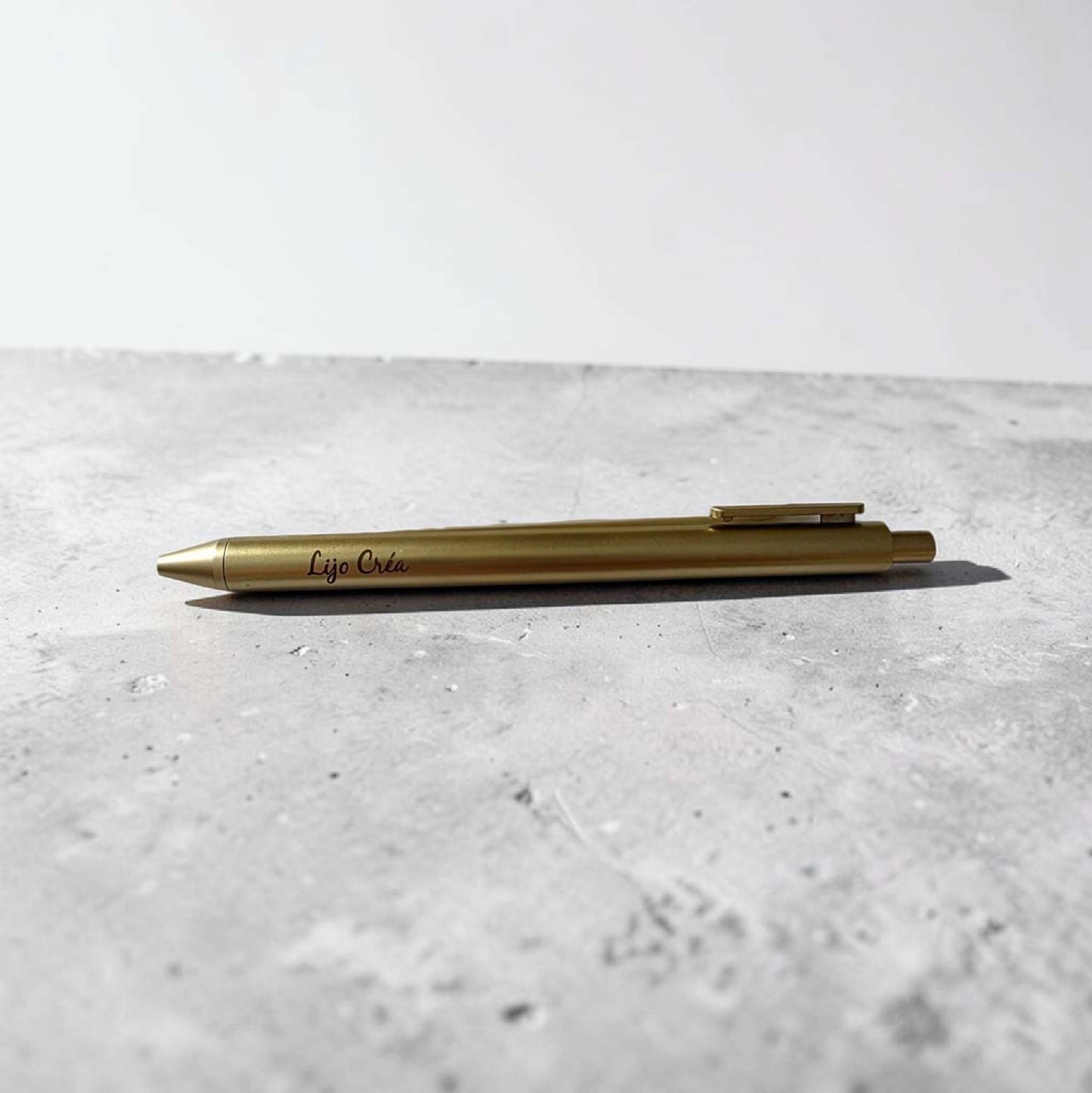 stylo doré gravé