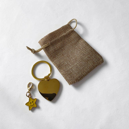 Porte clés doré coeur gravé