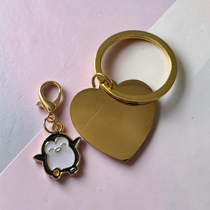 Porte clés doré coeur gravé