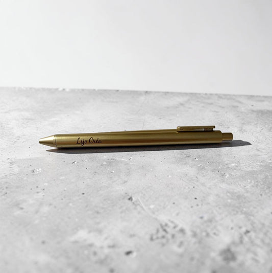 stylo doré gravé
